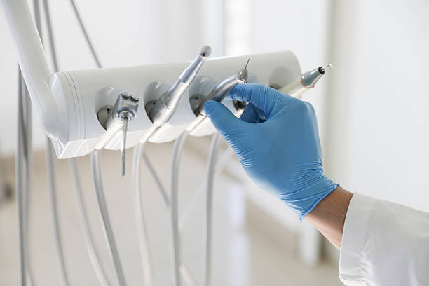 Professional Tooth Extraction technician working in Justice, OK